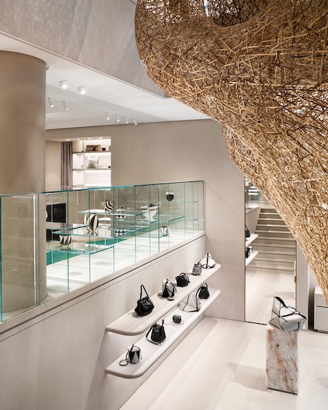 Natural light fills the boutique due to multi-level floor-to-ceiling windows. Image credit: LVMH
